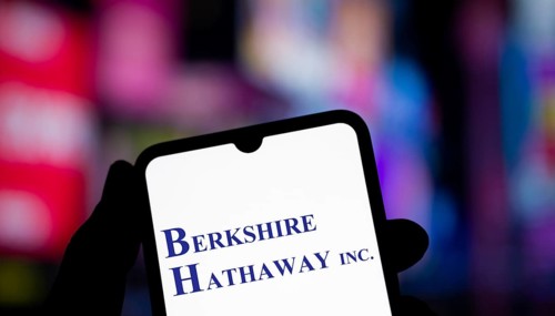 Berkshire Hathaway inc logo is displayed on smartphone. Berkshire Hathaway Inc is an American