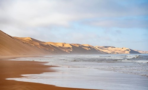 Sandy beach beach, sand dunes and sea in morning light, Atlantic coast and sandy desert with sea of
