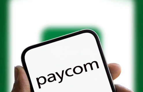 Dhaka, Bangladesh- 19 Jan 2025: paycom logo is displayed on smartphone. Paycom is an American