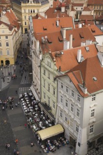 High angle view of buildings with traditional terracotta ceramic tiled rooftops and restaurant