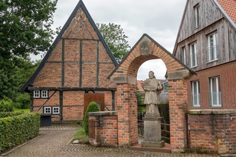 Nepomuk statue at the historic watermill, Stiftsmühle from 1653, Asbeck, Legden, Münsterland, North
