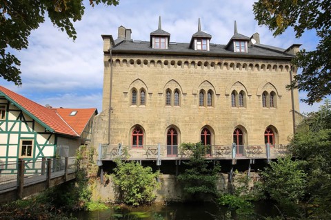 Neo-Gothic Fronveste built in 1845 and footbridge, Meiningen, Thuringia, Germany