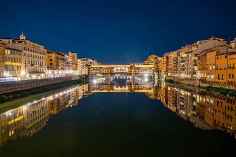 Ponte Vecchio bridge over Arno River at the blue hour, Florence, Tuscany, Italy