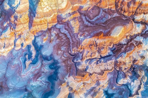 Aerial image showcasing the vivid colors and intricate patterns of bentonite clay formations in