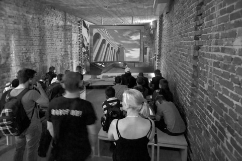 School class in the film screening room of the Documentation Center, Reichsparteitagsgelände, black
