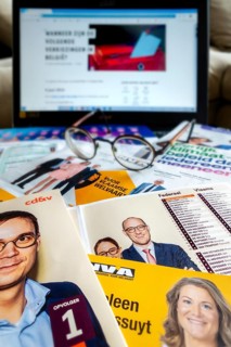 Parliament election campaign flyers, folders of different political parties' representatives for