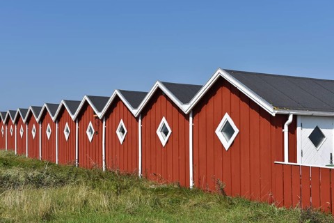 Wooden huts at Haarum harbour, Haarum Havn in Denmark