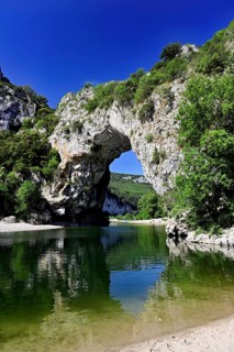 Ardèche river, above it the Pont d'Arc rock gate, Ardèche Gorge, Gorges de l'Ardèche,