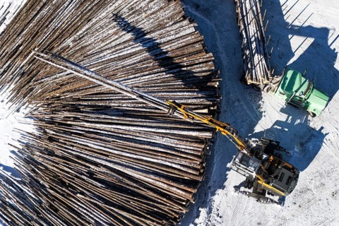 Heavy machinery unloading a lumber truck, Region of La Mauricie, Province of Quebec, Canada