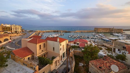 Super wide angle, view over houses to harbour, Venetian sea fortress Koules, Morosini, sailboats,