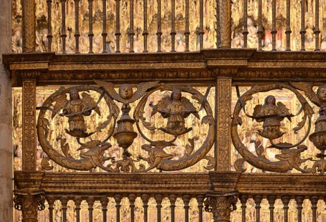 Golden decorative angel reliefs in religious context, Seville, Andalusia, Spain