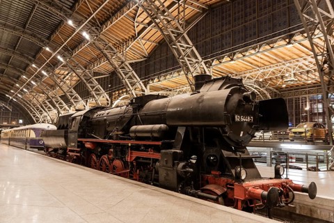 LEIPZIG, GERMANY - OCTOBER 8, 2018: Interior of the Leipzig Central Station with antique locomotive