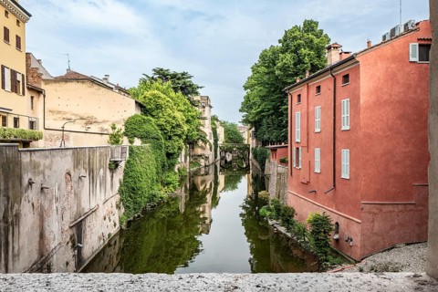 Canal in the historic city centre, Mantua, Italy