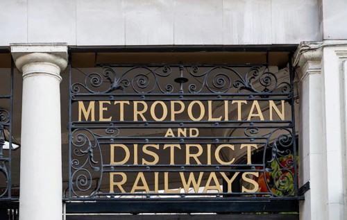 Classic entrance with Metropolitan and District Railways lettering, Kensington Station, Borough of