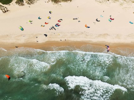 Kite surfers at the Los Lances beach near Tarifa. Aerial view. Drone shot. Cádiz province,