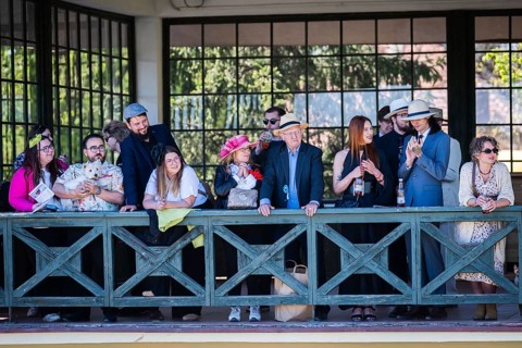 WROCLAW, POLAND - MAY 1, 2026: Horse race track WTWK Partynice. Crowd of elegant spectators wearing