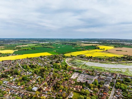 Fields and Farms over Bosham Quay from a drone, Chichester Harbour National Landscape, Chichester,