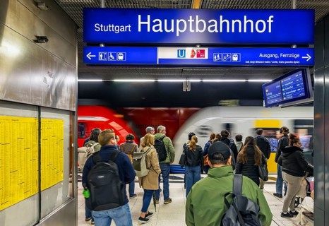 Subway platforms deep in the main train station with waiting passengers. Stuttgart,