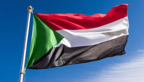 Flags, the national flag of Sudan flutters in the wind