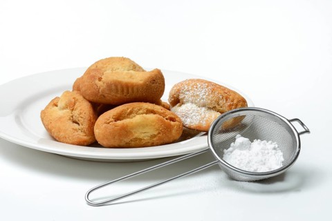 Schenkeli on a plate, sweet pastry for carnival time, Switzerland