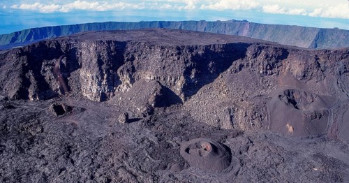 Aerial view of Cratère Dolomieu main crater from 2632 m high shield volcano Piton de la Fournaise