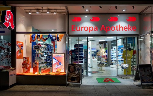 Night shot, Europa Apotheke, Logo, Rotebühlplatz, Stuttgart, Baden-Württemberg, Germany