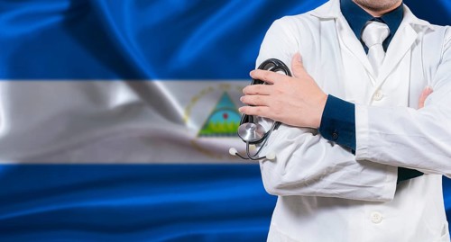 Nicaraguan national health system, Medical professional holding sthetoscope isolated