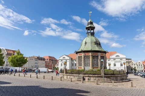 The city's landmark, Wismar water art on the market square, in the town hall, Hanseatic City of