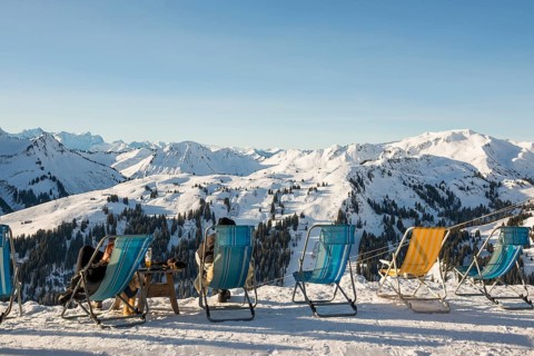 Snow-covered mountain landscape and deckchairs, Damüls, Bregenzerwald, Vorarlberg, Austria