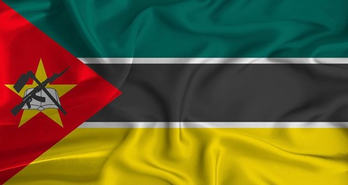 Realistic Mozambique flag waving. Close up of flag of Mozambique with cloth texture