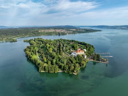 The island of Mainau in Lake Constance with the jetty and the baroque Mainau Castle, built between