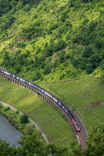The 786 meter long railway hangviaduct, longest in Germany, freight train, near the wine town of