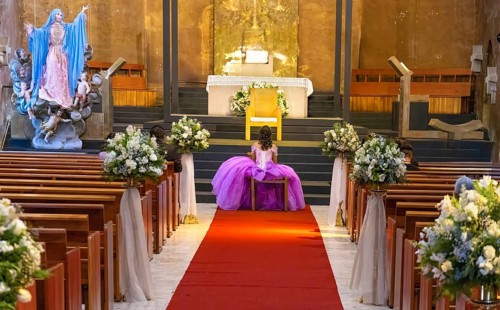 Typical Mexican church with a bride preparing for a wedding inside the church