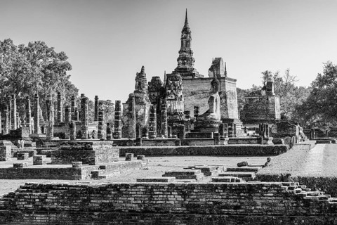 Historic Buddhist temple complex Wat Mahathat, historical park, black and white photo, Sukhothai,