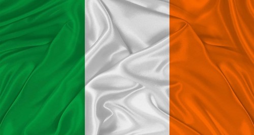 Close up of flag of Ireland with cloth texture. Realistic Ireland flag waving