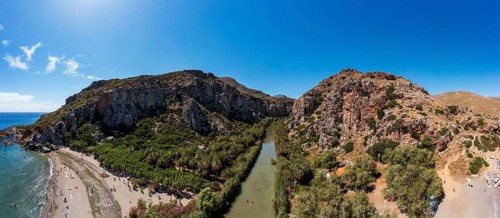 Palm beach, Preveli Beach at the end of the Kourtaliatiko Gorge, south coast, Crete, Greece