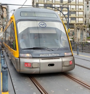 Metro do Porto tram train crossing Dom Luis bridge, Porto, Portugal, Europe destination Vila d Este