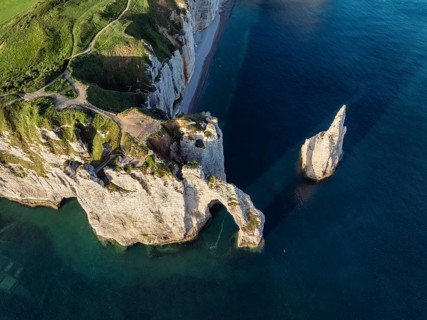 Aerial view, top-down view of the Porte d'Aval rock formation with the free-standing Aiguille
