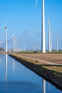 Wind farm on the Slaperdijk dike near Eemshaven, on which dikes are, as a test project, 17000 solar