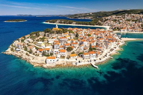 The peninsula with the old town centre of Primosten seen from the air, Croatia