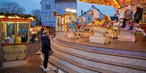 Cranger Weihnachtszauber with Alt Wiener horse carousel, Christmas funfair in the Ruhr area, Herne,