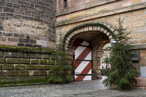 Christmas trees with fairy lights at the Königstor, Handwerkerhof, Nuremberg, Middle Franconia,