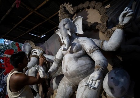 Guwahati, India. 4 September 2024. Artisan work on idols of the elephant-headed Hindu deity Ganesha