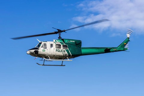 A Policia Colombia Bell 212HP helicopter with license plate HK-5404 at Enrique Olaya Herrera