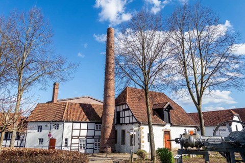 Tuchmachermuseum Bramsche, Lower Saxony, Germany, Historic factory under a blue sky