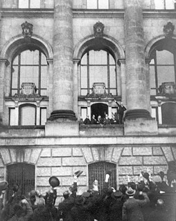 Philipp Scheidemann proclaims the Republic from the west balcony of the Reichstag in Berlin on 8