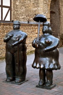 Bronze sculptures entitled Man with stick, Woman with umbrella by Fernando Botero, Goslar, Lower