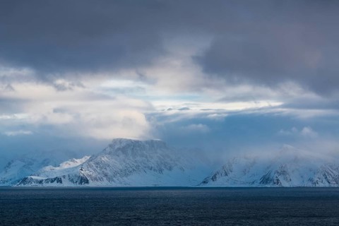Snowy mountains on the Norwegian Sea, Loppa, Finnmark, Norway, March 2019