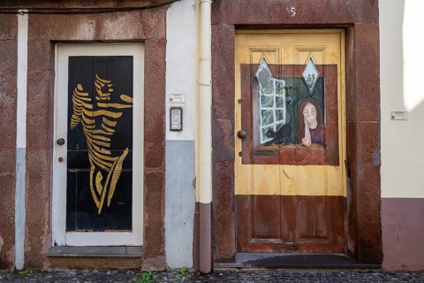 Colourfully painted doors on Santa Maria Street in the old town, Funchal, Madeira, Portugal