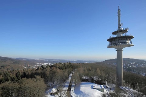View from observation tower to telecommunications tower in winter with snow, landscape, summit,